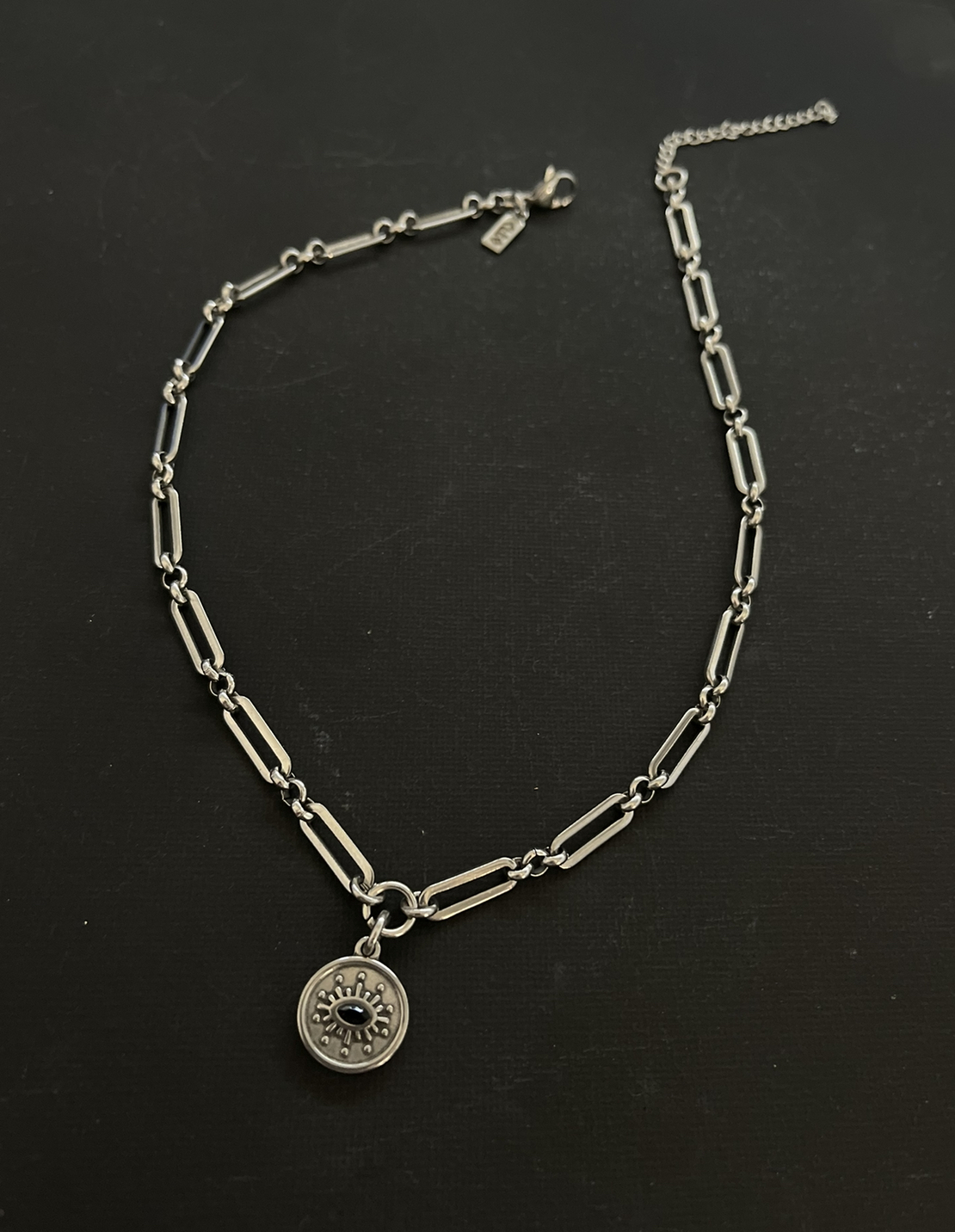 Black eye necklace