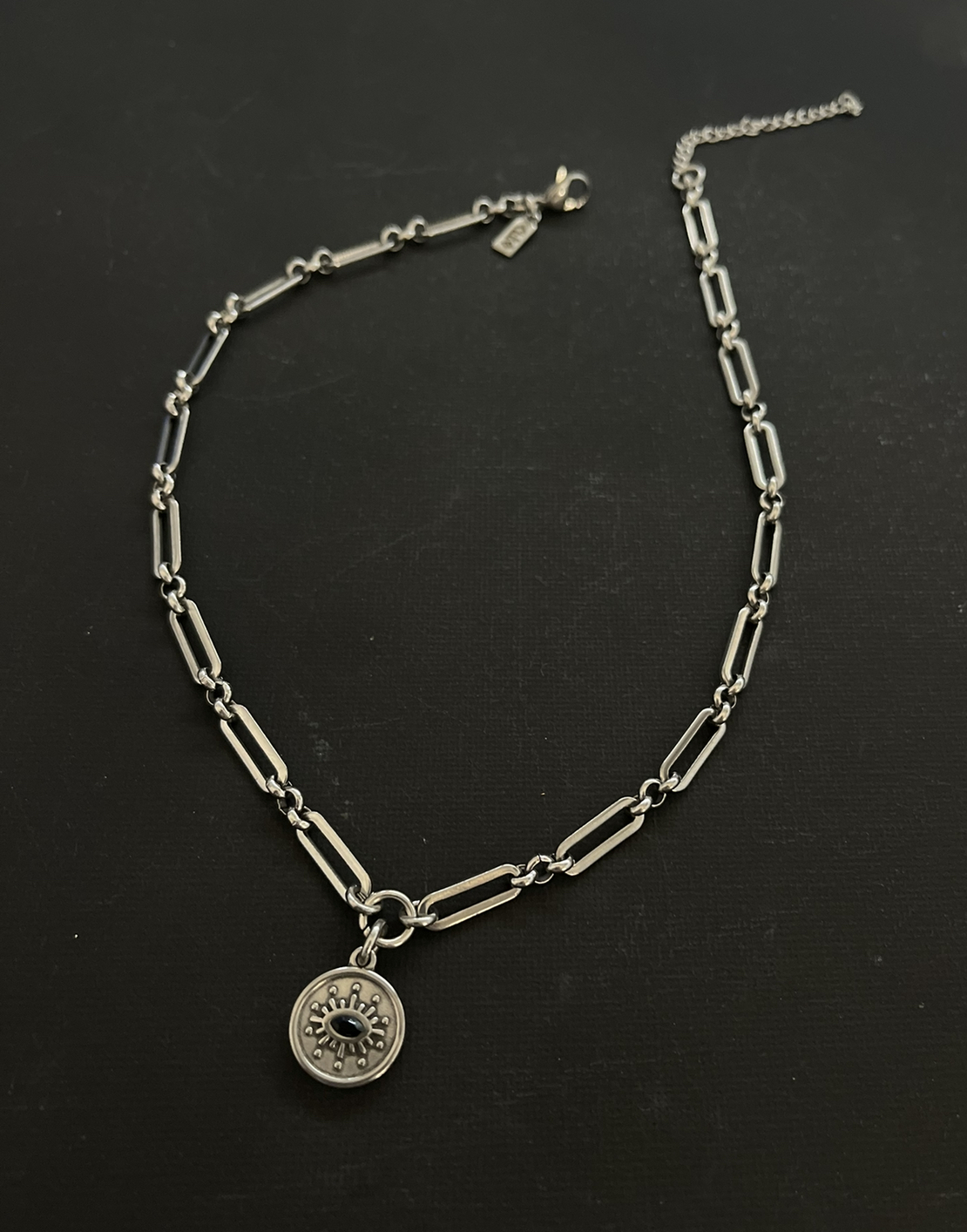 Black eye necklace