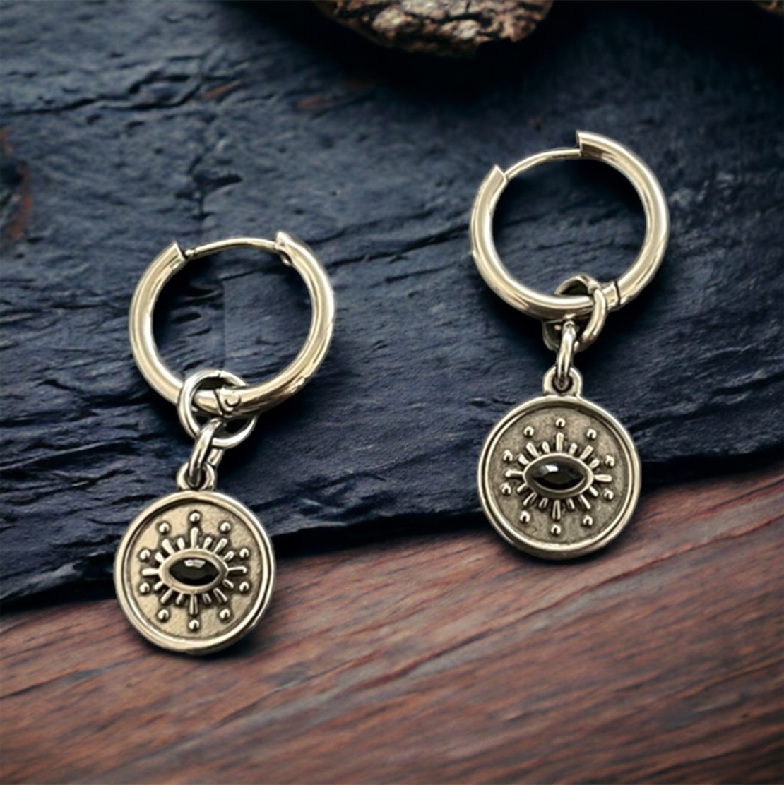 Black eye earrings