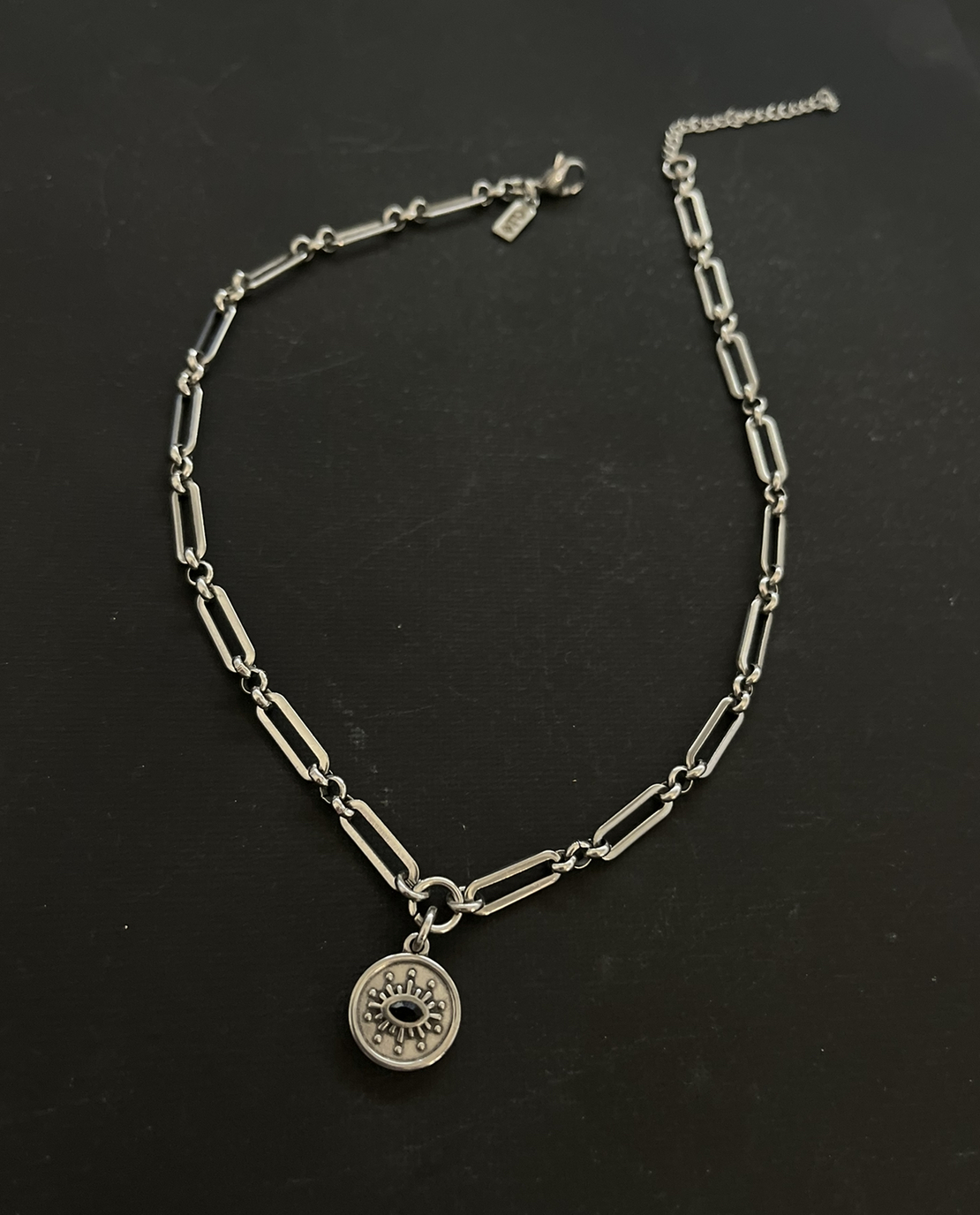 Black eye necklace