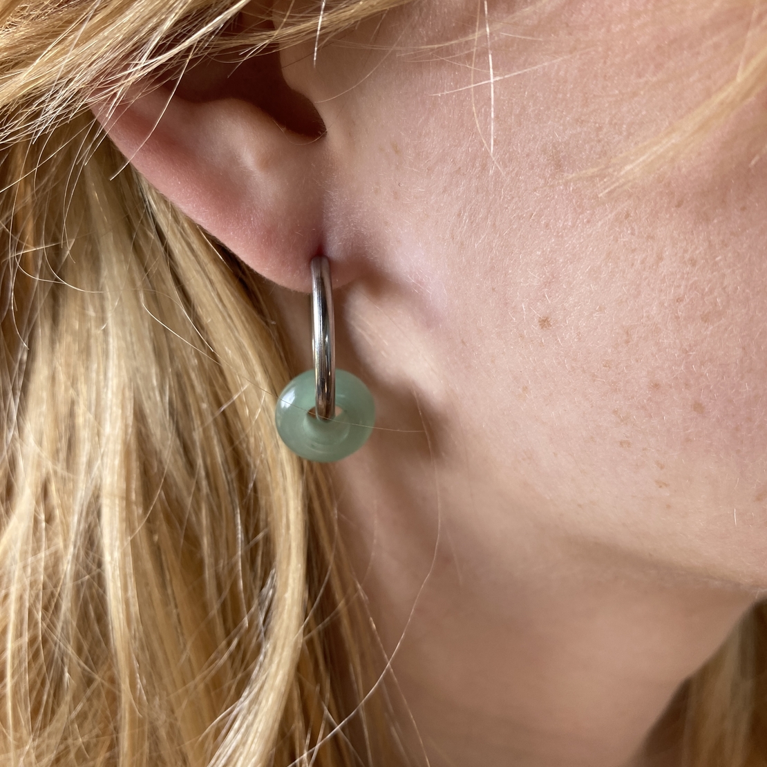 Silver plated hoop earrings with a stone bead - light green