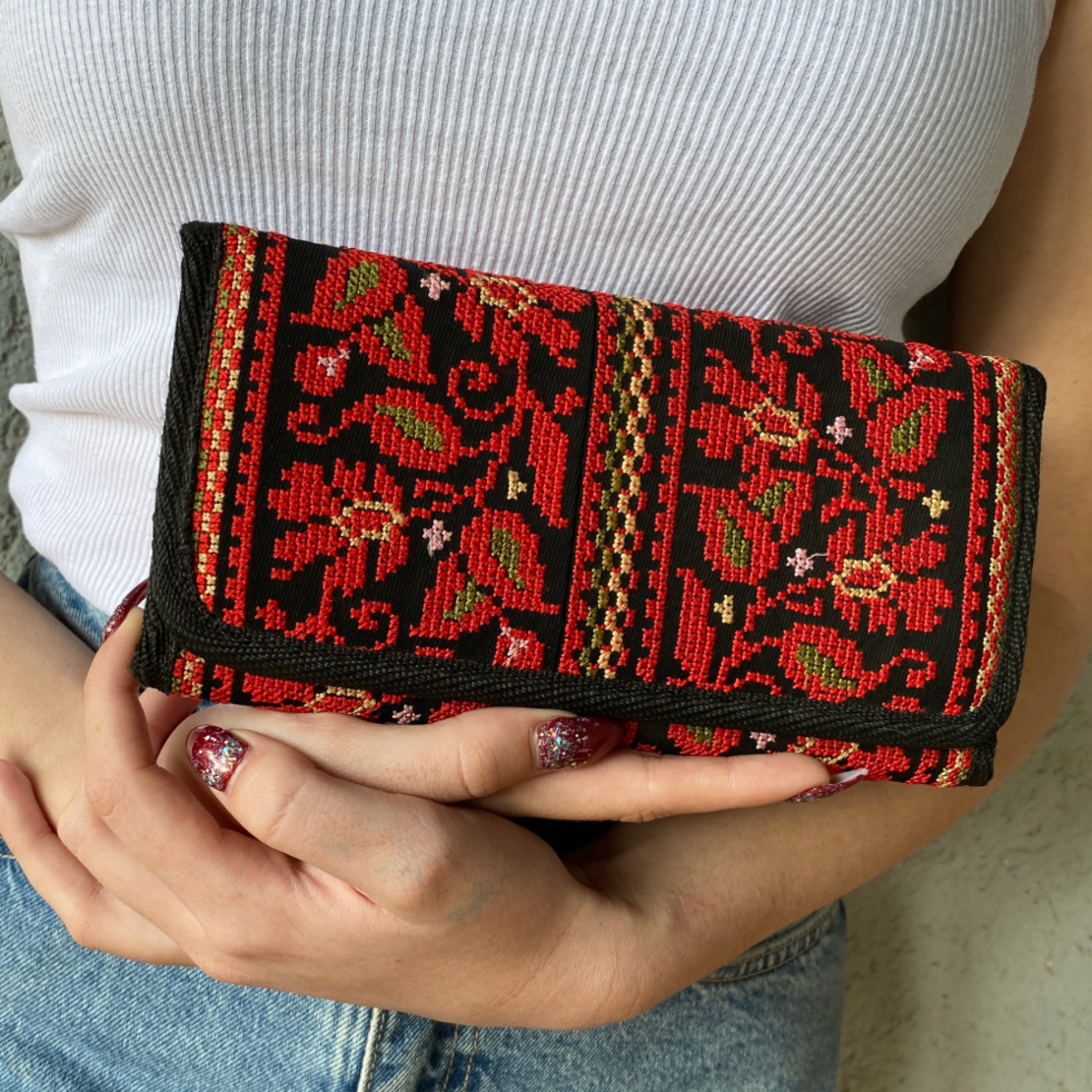 Embroidered purse with red flowers