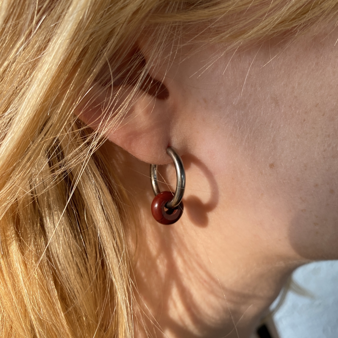 Silver plated hoop earrings with a stone bead - wine red