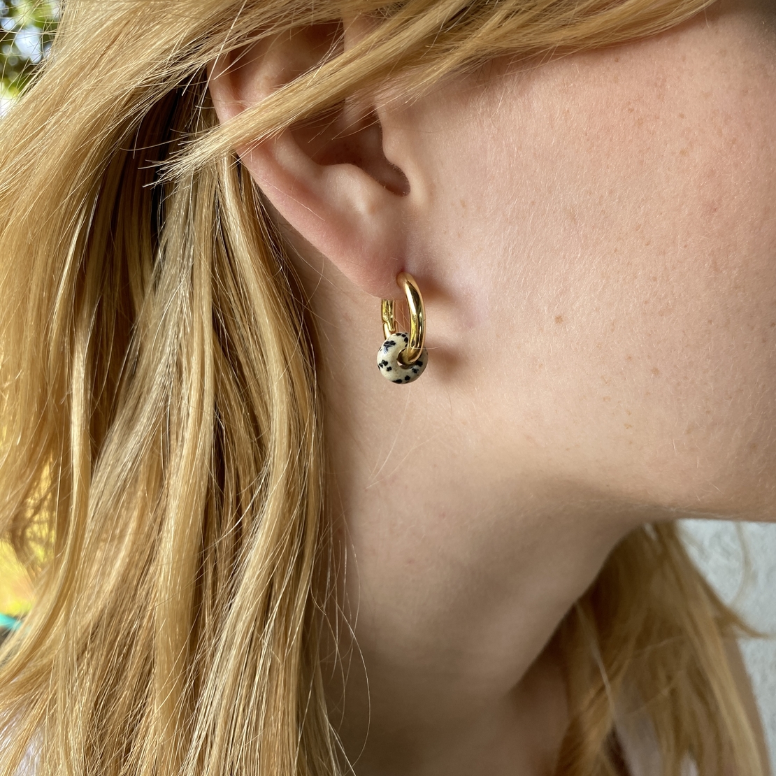 Gold plated hoop earrings with a stone bead - dalmatian