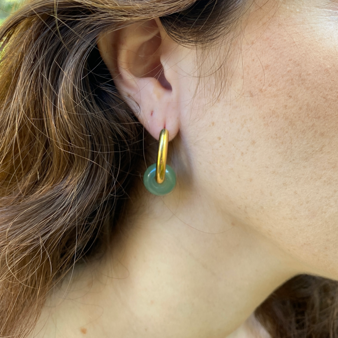 Gold plated hoop earrings with a stone bead - light green