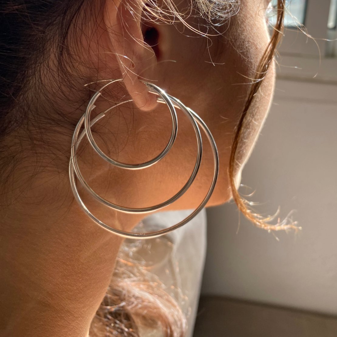 big silver hoop earrings