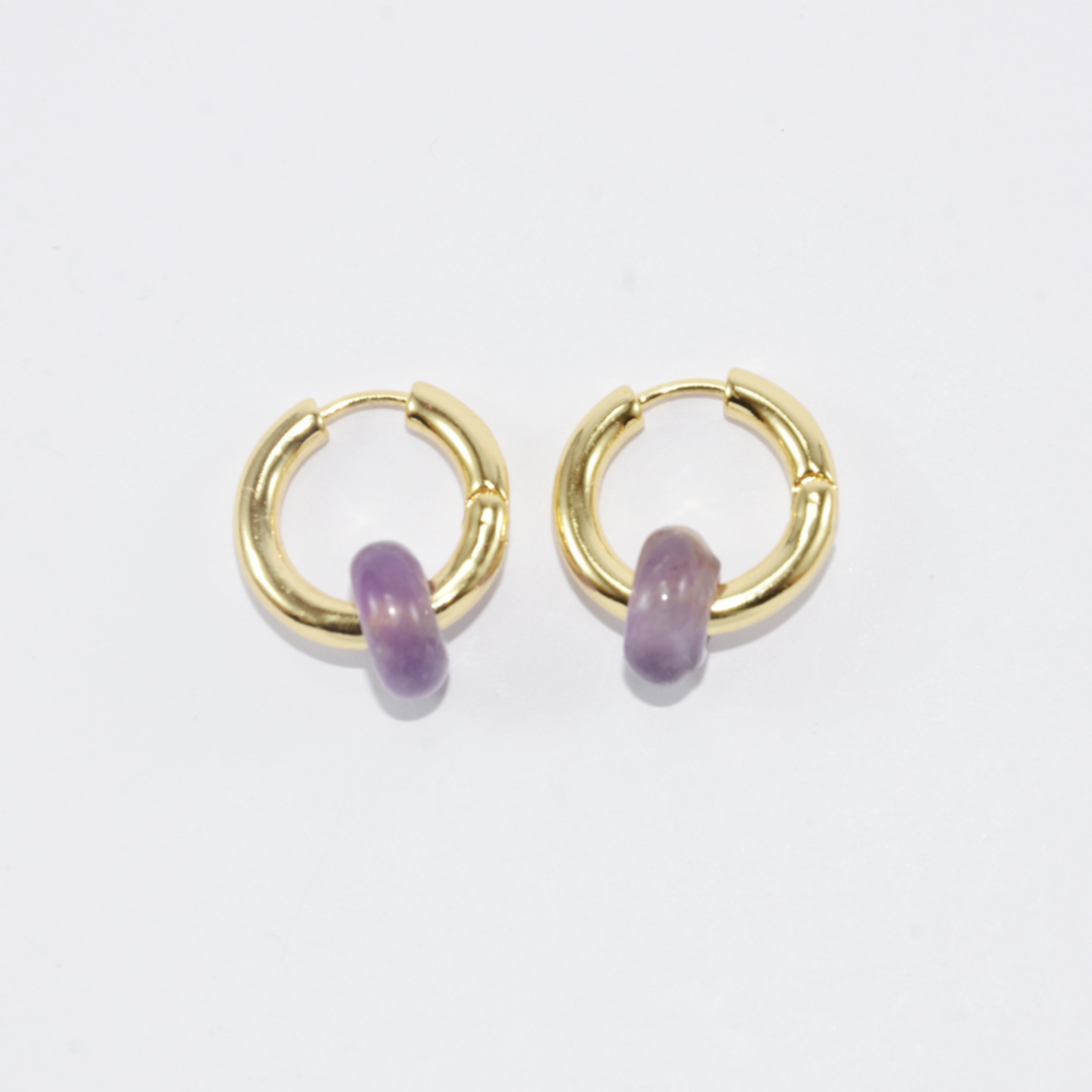 Gold plated hoop earrings with a stone bead - amethyst