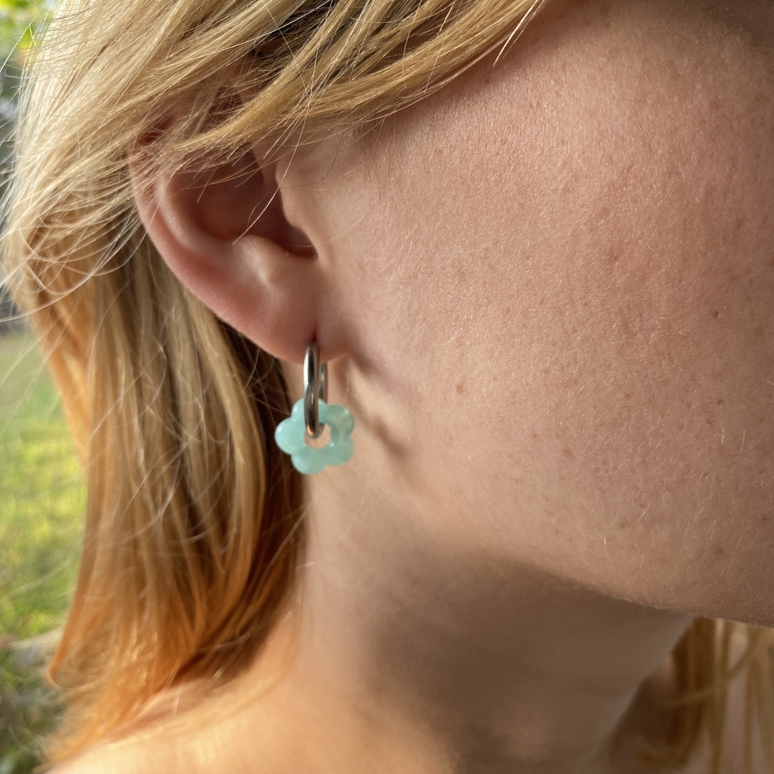 Silver plated hoop earrings with a stone bead - light blue flower