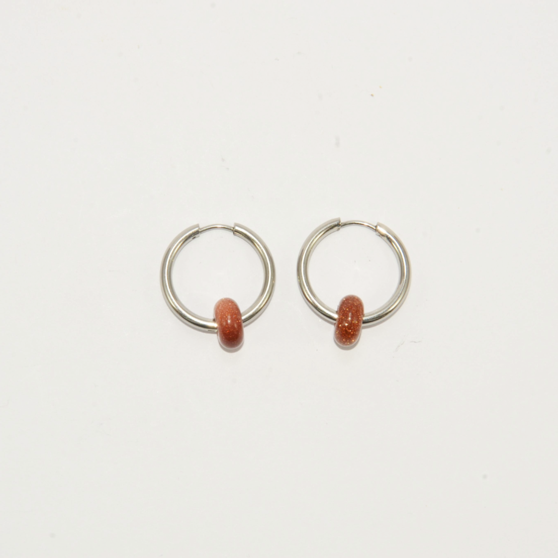 Silver plated hoop earrings with a stone bead - sparkling red