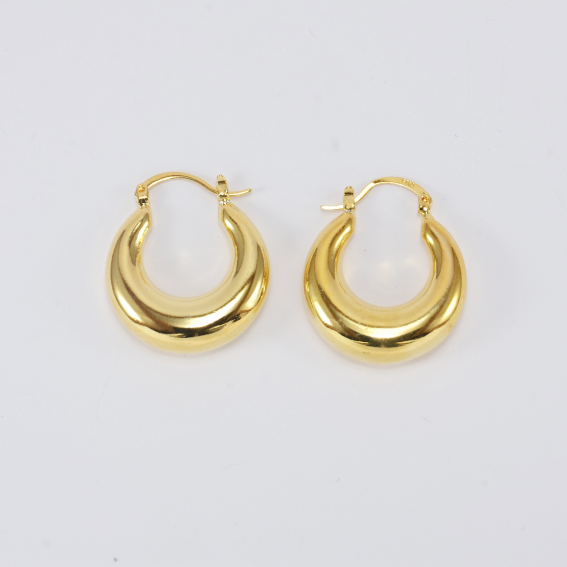 Thick gold hoop earrings