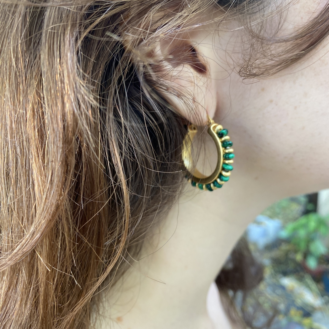 Gold-plated hoop earrings with malachite and brass beads