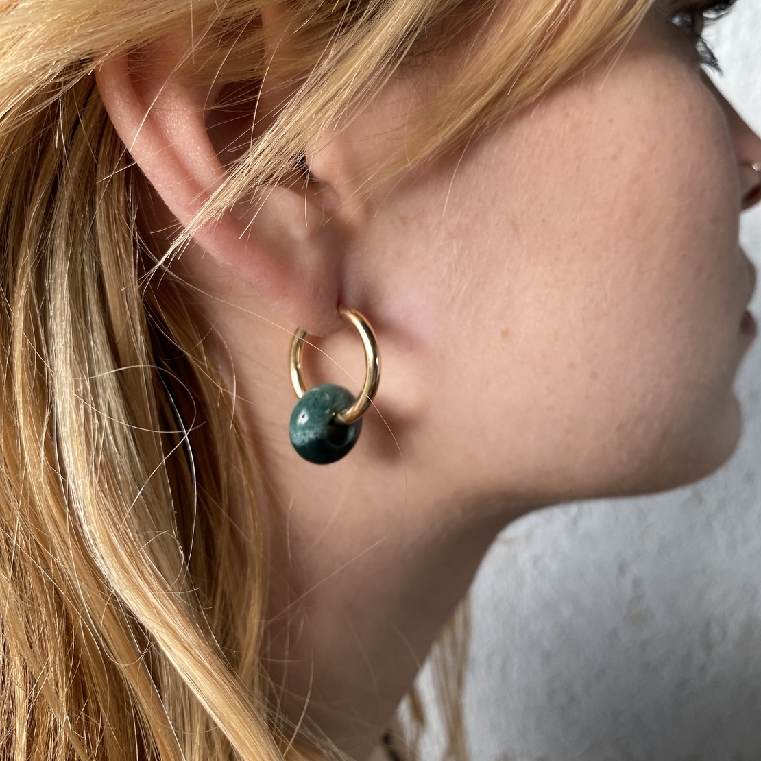 Gold plated hoop earrings with a stone bead - sea green