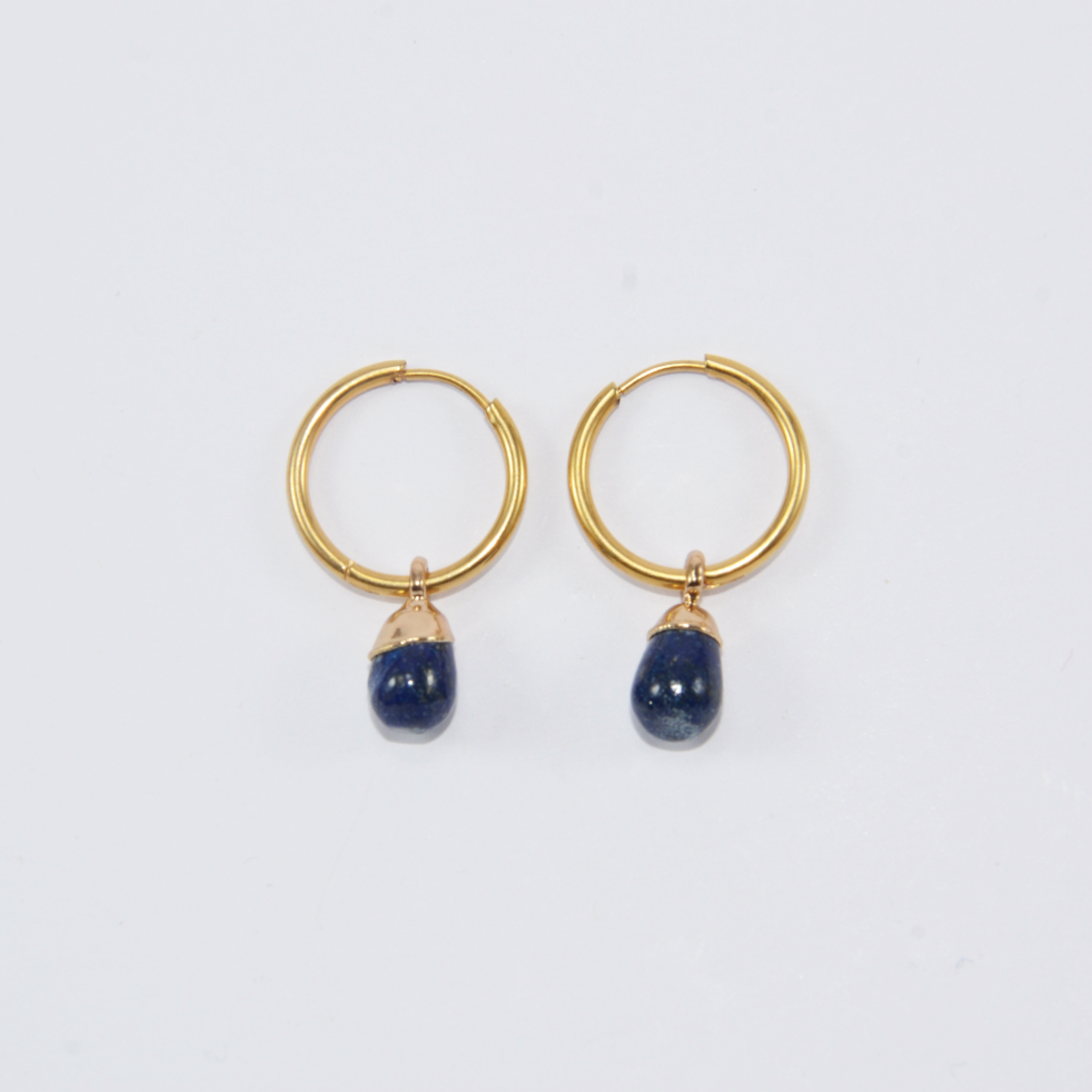 Thin hoop earring with a blue drop