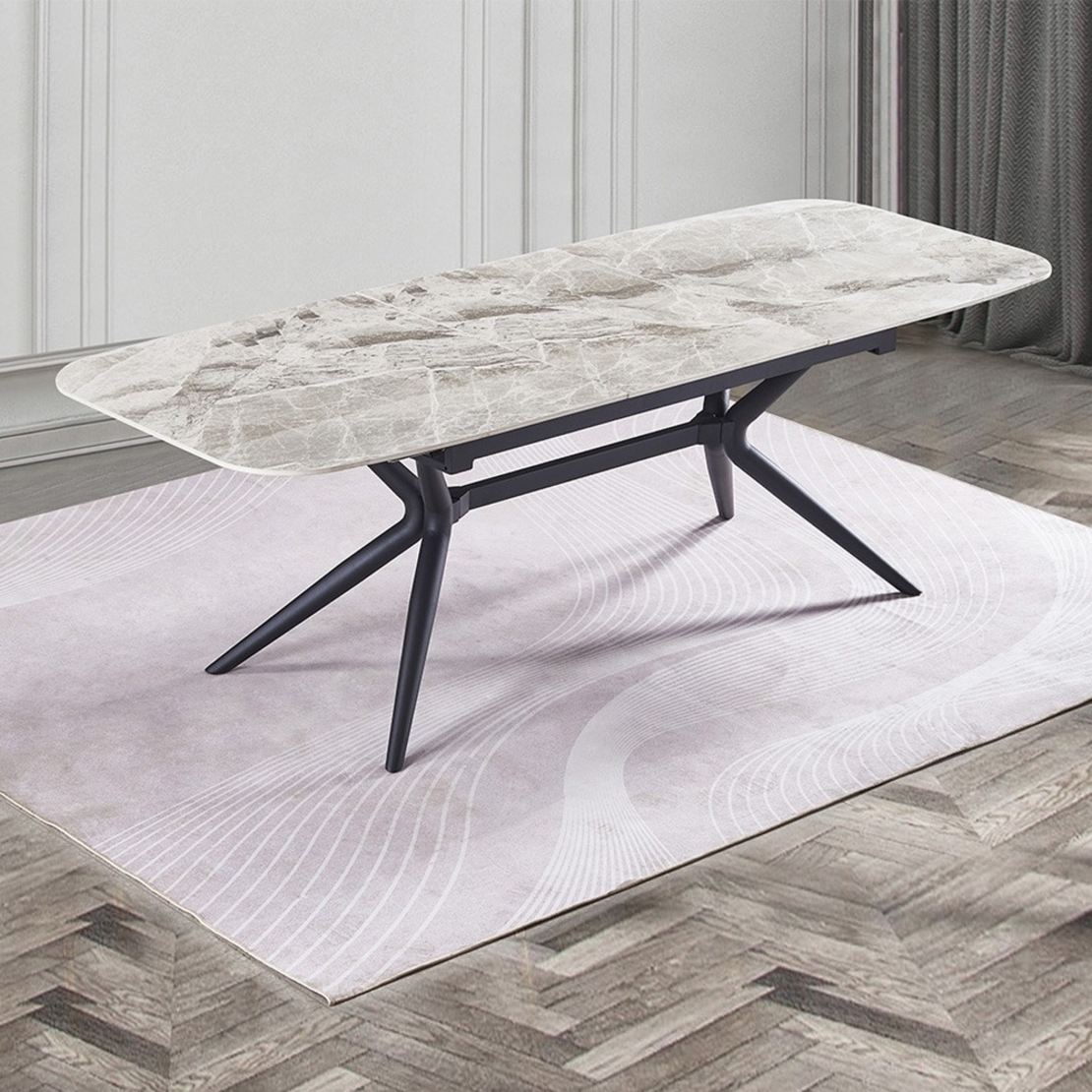 שולחן אוכל אבן קרמית באורך 1.8 מ' נפתח ל- 2.4 מ' עם רגלי ברזל דגם חץ אפור מבריק