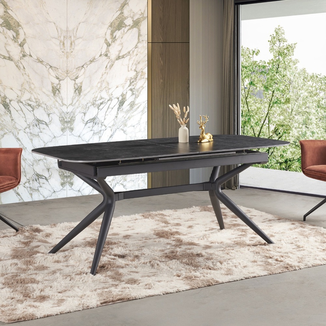 שולחן אוכל אבן קרמית באורך 1.8 מ' נפתח ל- 2.4 מ' עם רגלי ברזל דגם חץ אפור פחם