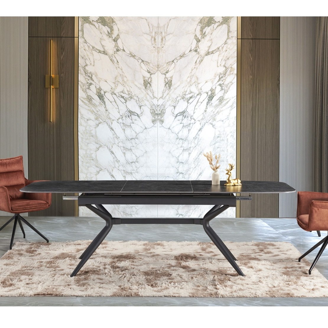 שולחן אוכל אבן קרמית באורך 1.8 מ' נפתח ל- 2.4 מ' עם רגלי ברזל דגם חץ אפור פחם