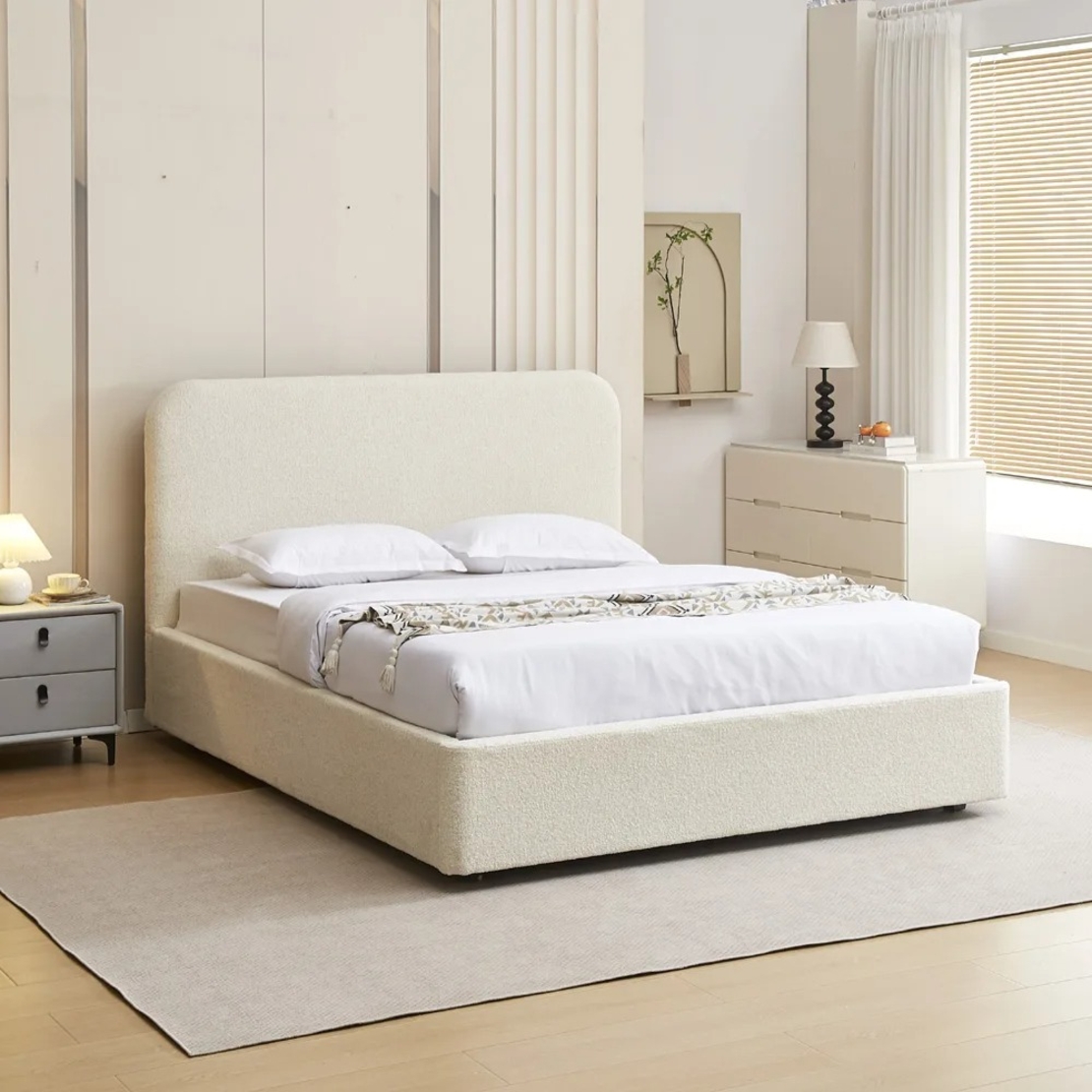 מיטה זוגית מעוצבת בריפוד בד בוקלה עם ארגז מצעים מעץ דגם נוגה שמנת