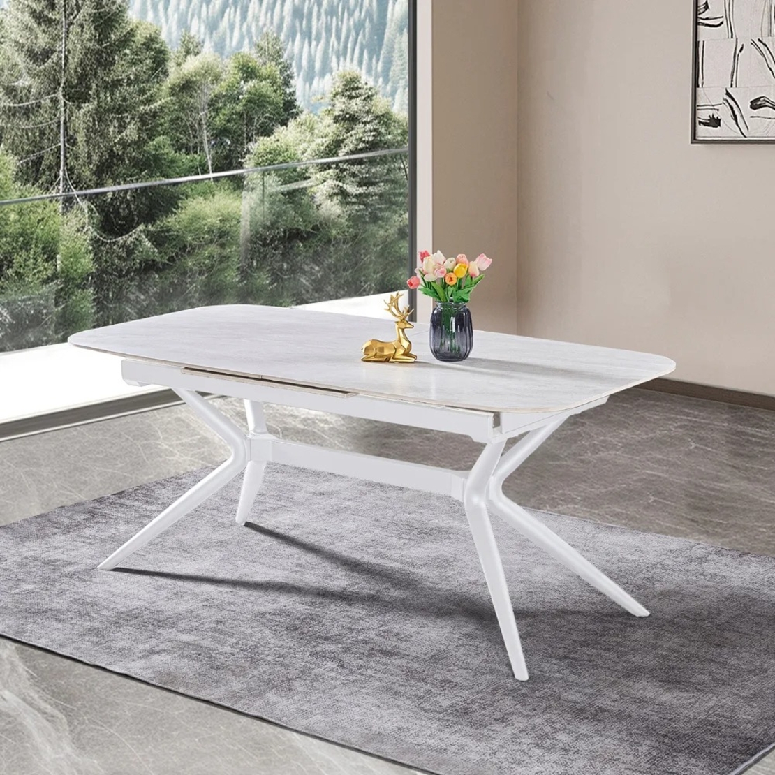 שולחן אוכל אבן קרמית באורך 1.8 מ' נפתח ל- 2.4 מ' עם רגלי ברזל דגם חץ אבן