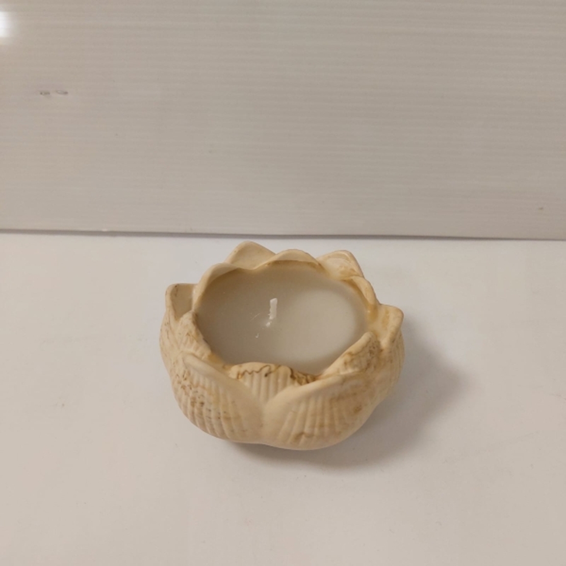 נר פרח בצבעי אדמה