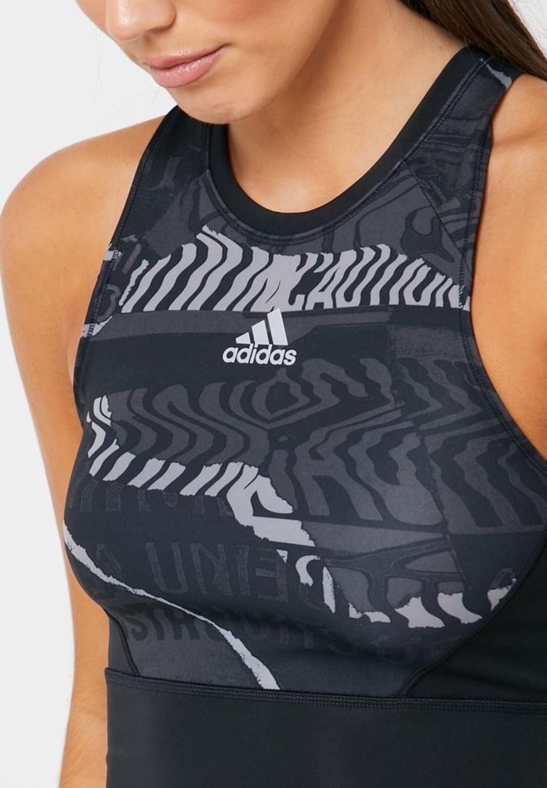 גופיית אדידס לנשים | Adidas Own The Run City Clash Crop Top