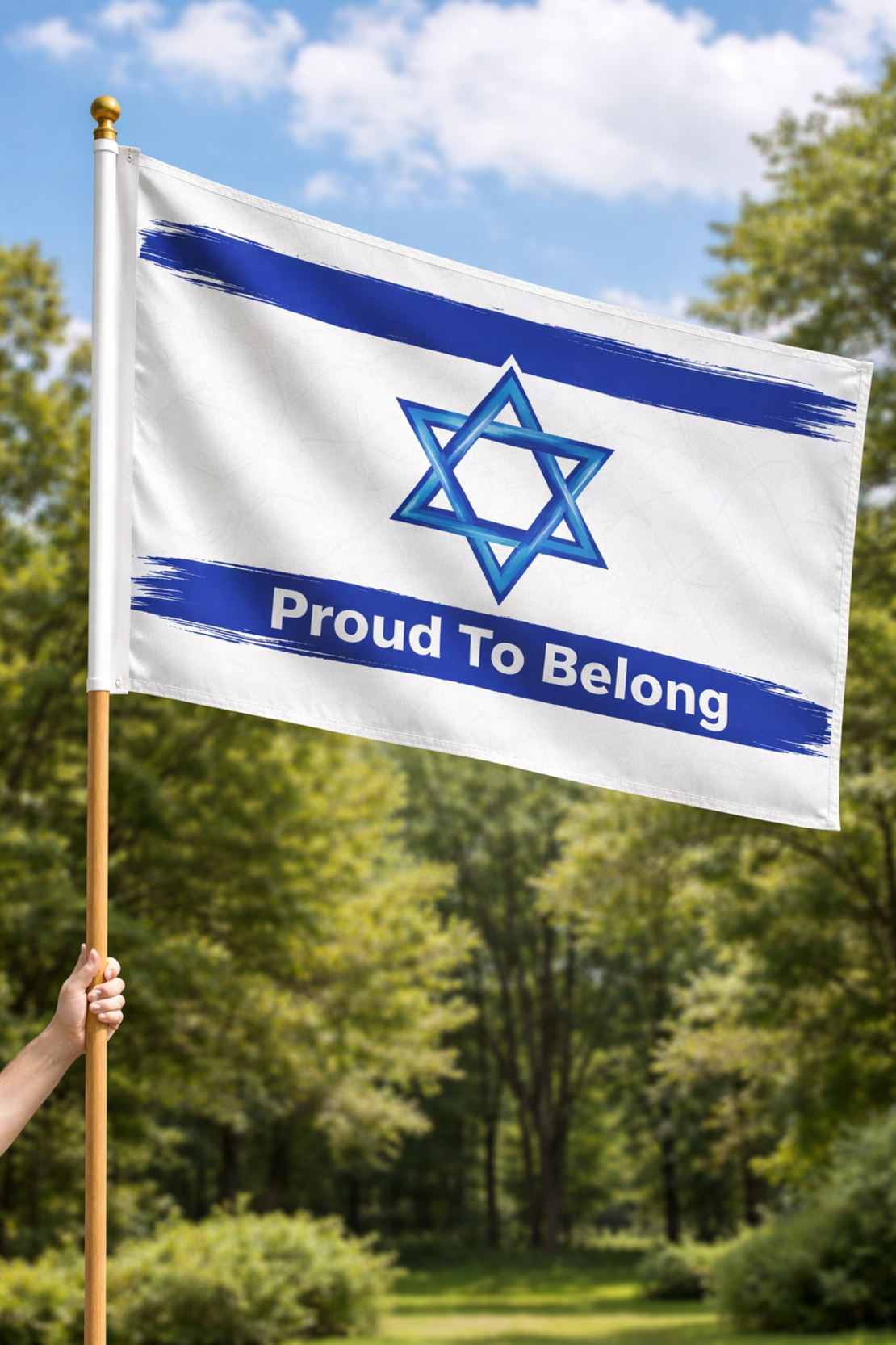 דגל ישראל 80×100 איכותי | דגל ישראל PROUD TO BELONG  לתלייה לבית, ולאירועים עשוי מפוליסטאר עמיד ברוח