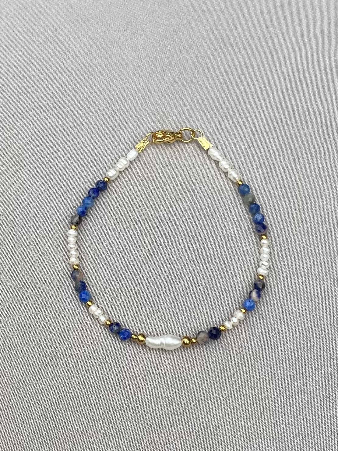 צמיד פנינים לאפיס