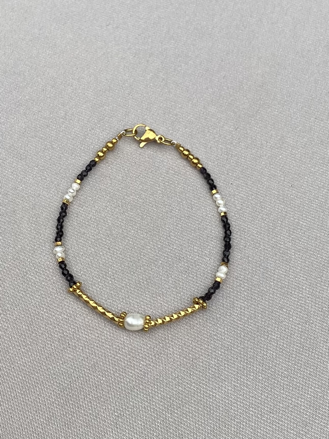 צמיד אוניקס גולדפילד