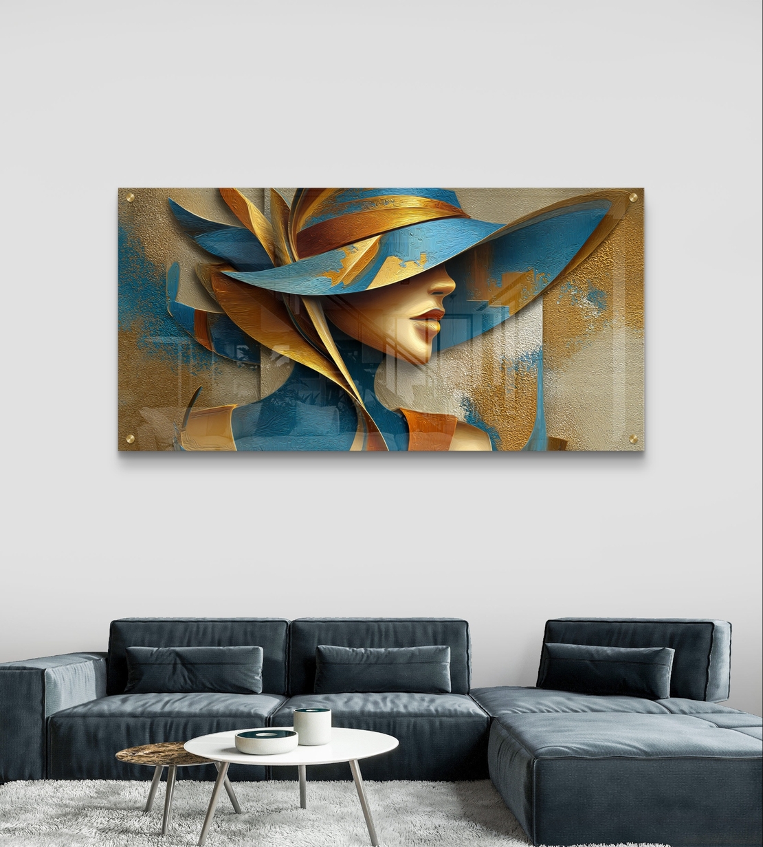 תמונת קיר זכוכית אופנתית עם דיוקן אישה וכובע דרמטי בגווני כחול וזהב לעיצוב מודרני