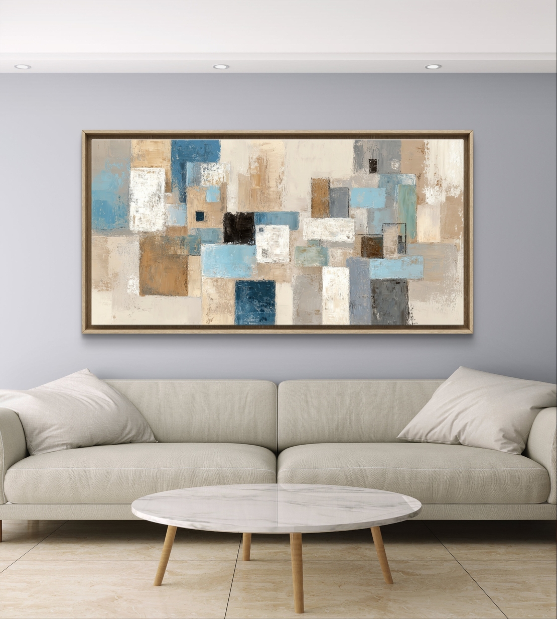 תמונת קנבס לרוחב בעיצוב אבסטרקטי גאומטרי בגווני תכלת, אפור ושמנת לסלון מודרני