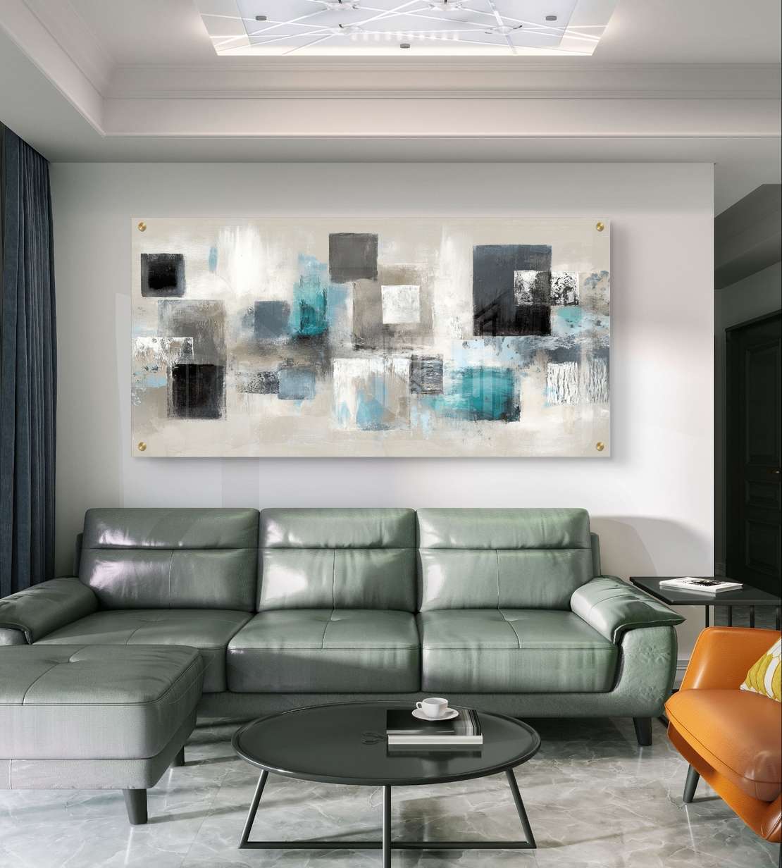 תמונת זכוכית לרוחב עם ריבועים אבסטרקטיים בגווני שחור, אפור וטורקיז על רקע בהיר – תכשיט לבית