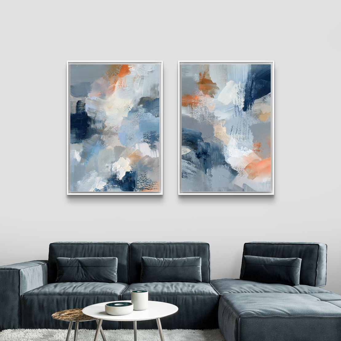 סט תמונות קנבס זוגי בגווני כחול, אפור וכתום בעיצוב אבסטרקטי רך – תכשיט לבית