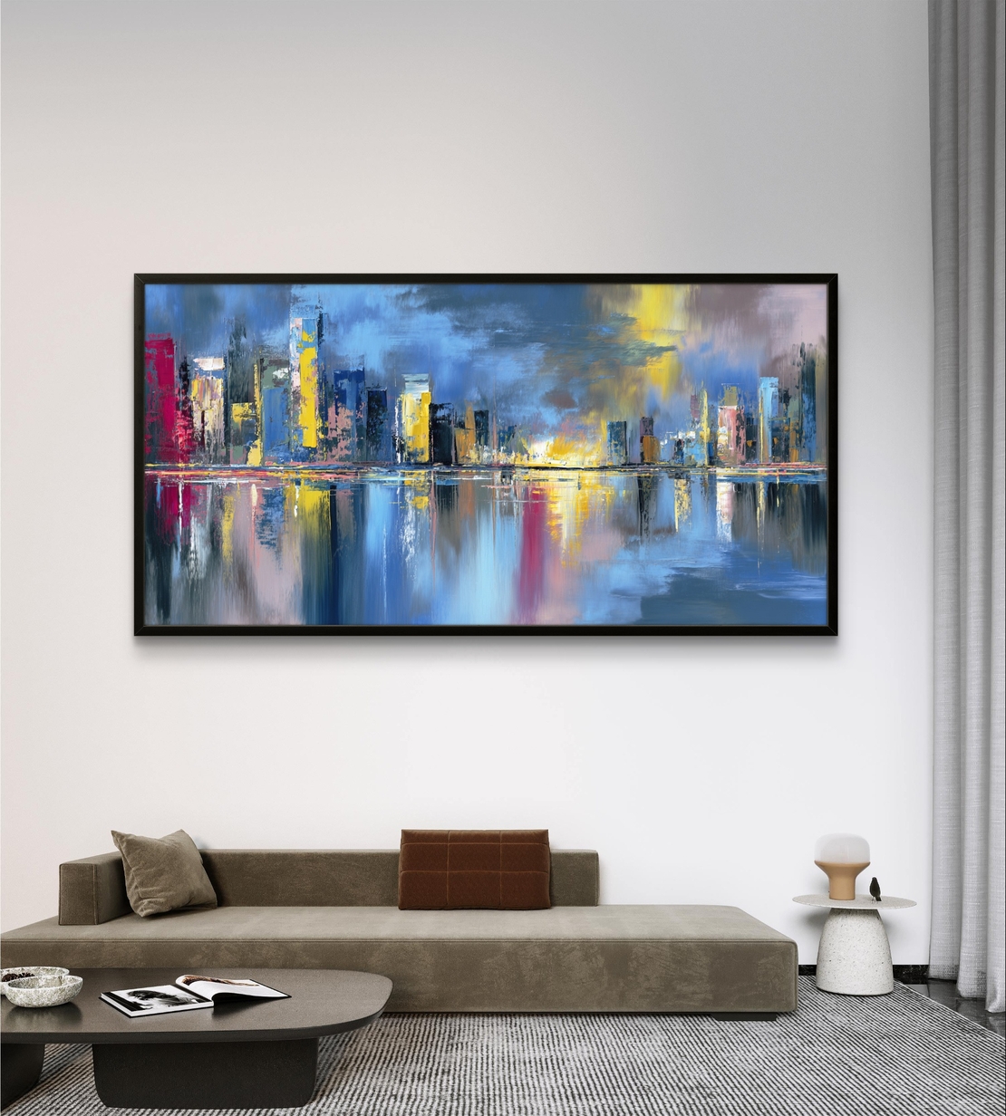 קנבס מודרני של קו רקיע עירוני בלילה עם צבעים חזקים והשתקפות על מים