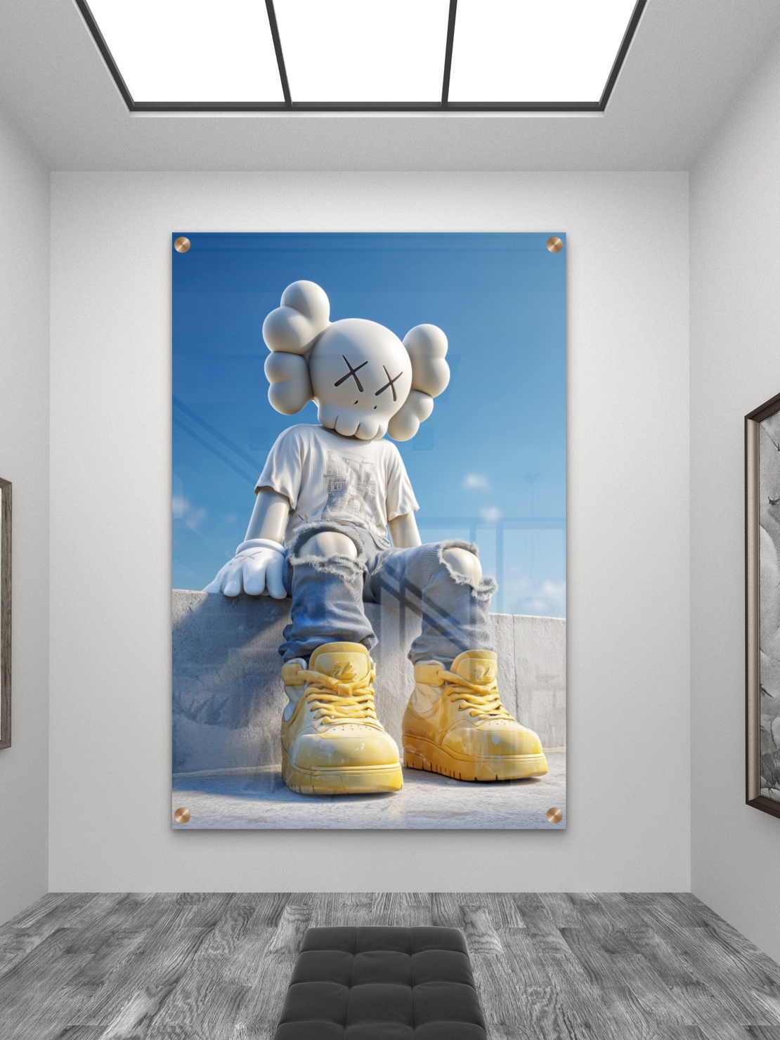 תמונת זכוכית של דמות KAWS בלבוש לבן וג’ינס יושבת על קיר בטון עם נעלי סניקרס צהובות על רקע שמיים כחולים – מתוך קולקציית NEXTGEN BY BAR של תכשיט לבית.