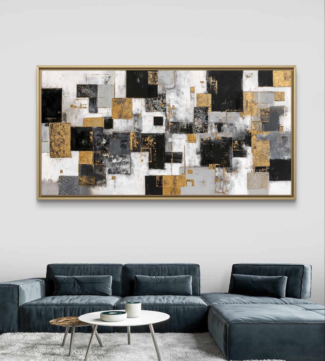 תמונת קנבס אבסטרקטית עם בלוקים גיאומטריים בגווני שחור, לבן, אפור וזהב