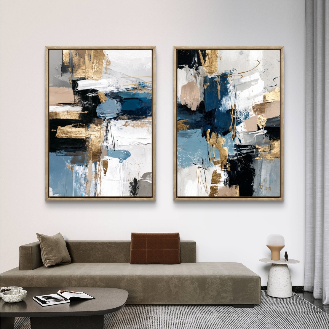 תמונת קנבס זוגית אבסטרקטית בגווני כחול, שחור ולבן עם נגיעות זהב בעיצוב מודרני