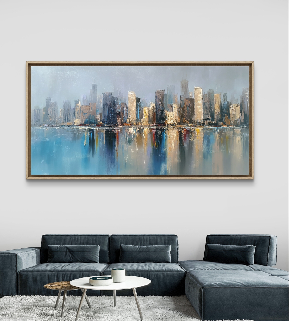 תמונת קנבס של קו רקיע מודרני המשתקף במים בגווני כחול וזהב, בהדפסה חלקה ללא תבליט.
