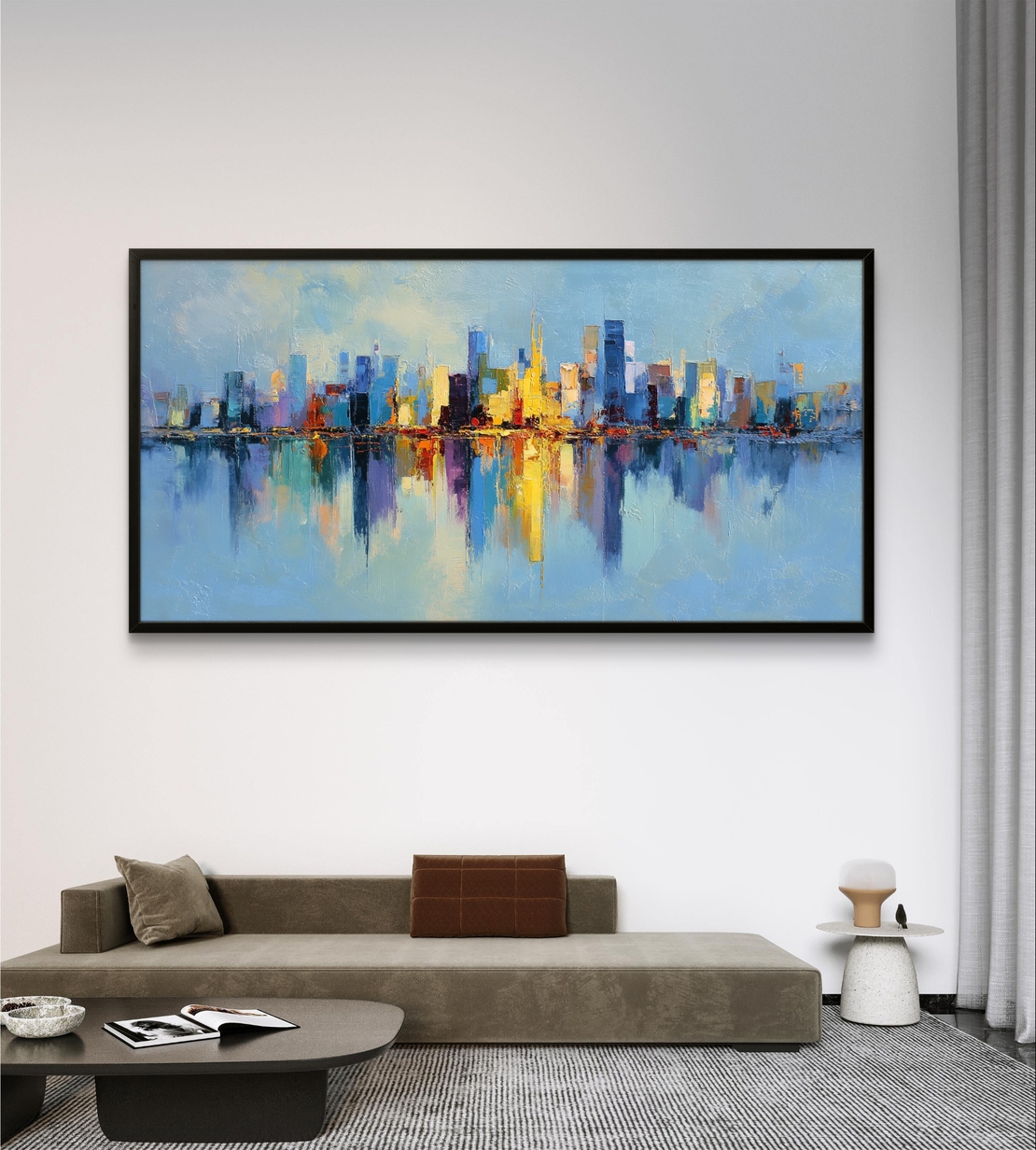 תמונת קנבס לרוחב עם קו רקיע עירוני צבעוני והשתקפות במים בעיצוב מודרני