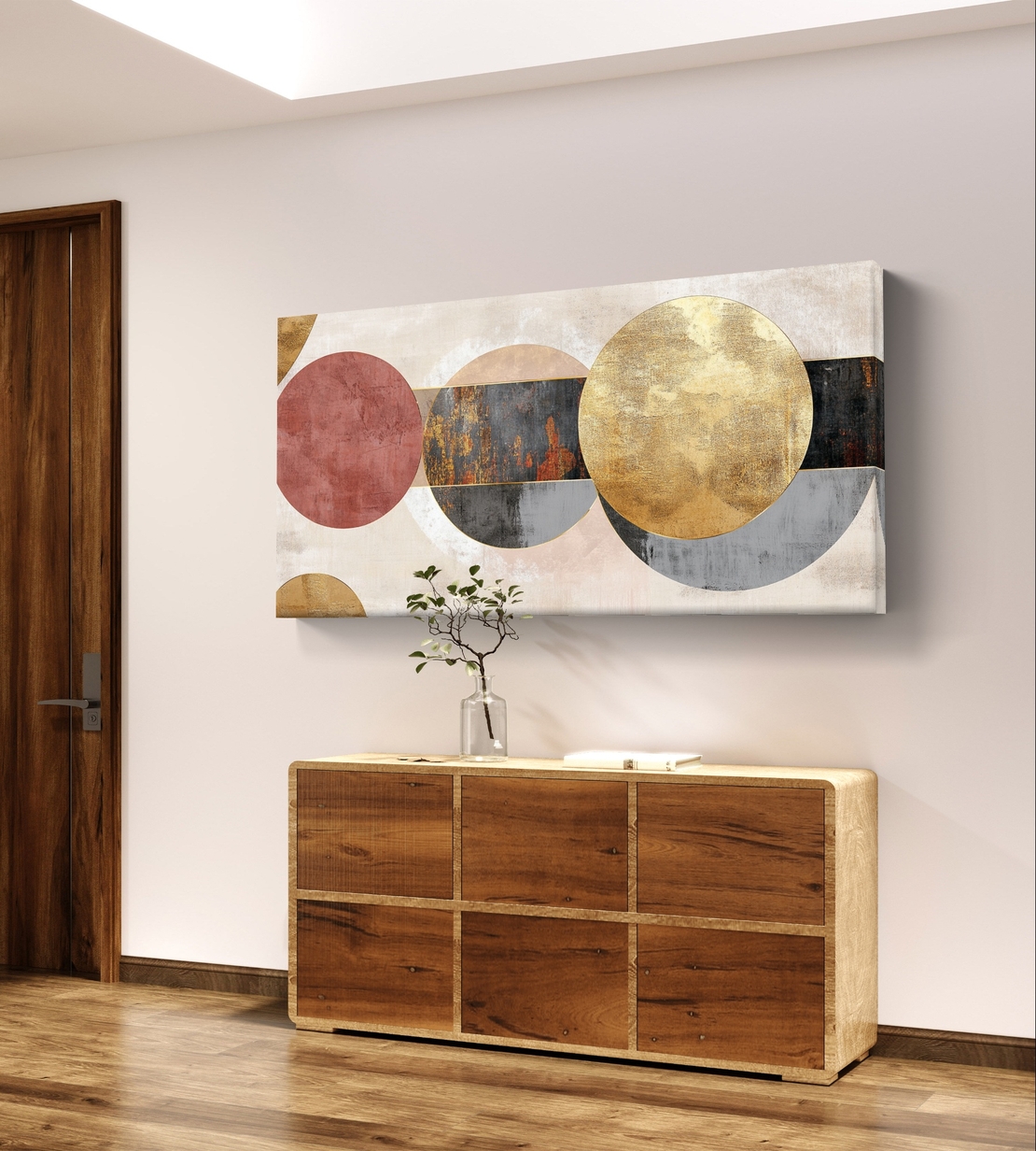 תמונת קנבס לרוחב בעיצוב אבסטרקטי עם מעגלים חופפים בגווני שמנת, זהב ואפור על רקע בהיר.