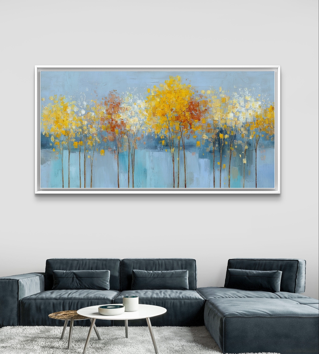 תמונת קנבס של עצים עדינים בגווני תכלת, צהוב ולבן על רקע בהיר