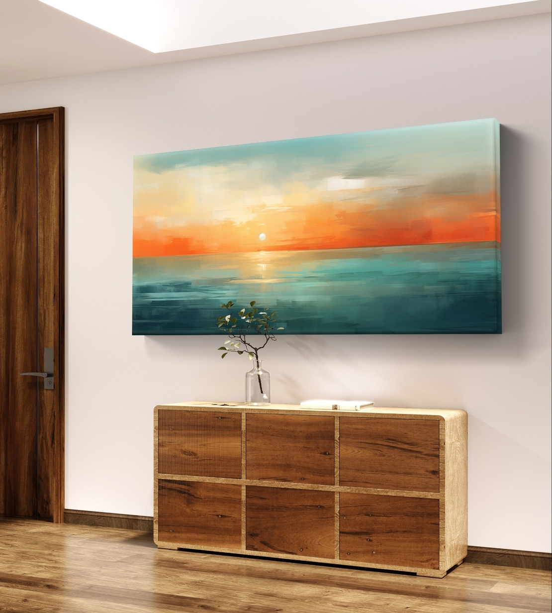 תמונת קנבס לרוחב עם שקיעה אבסטרקטית מעל הים בגווני תכלת, כתום וחול בעיצוב רגוע ואלגנטי