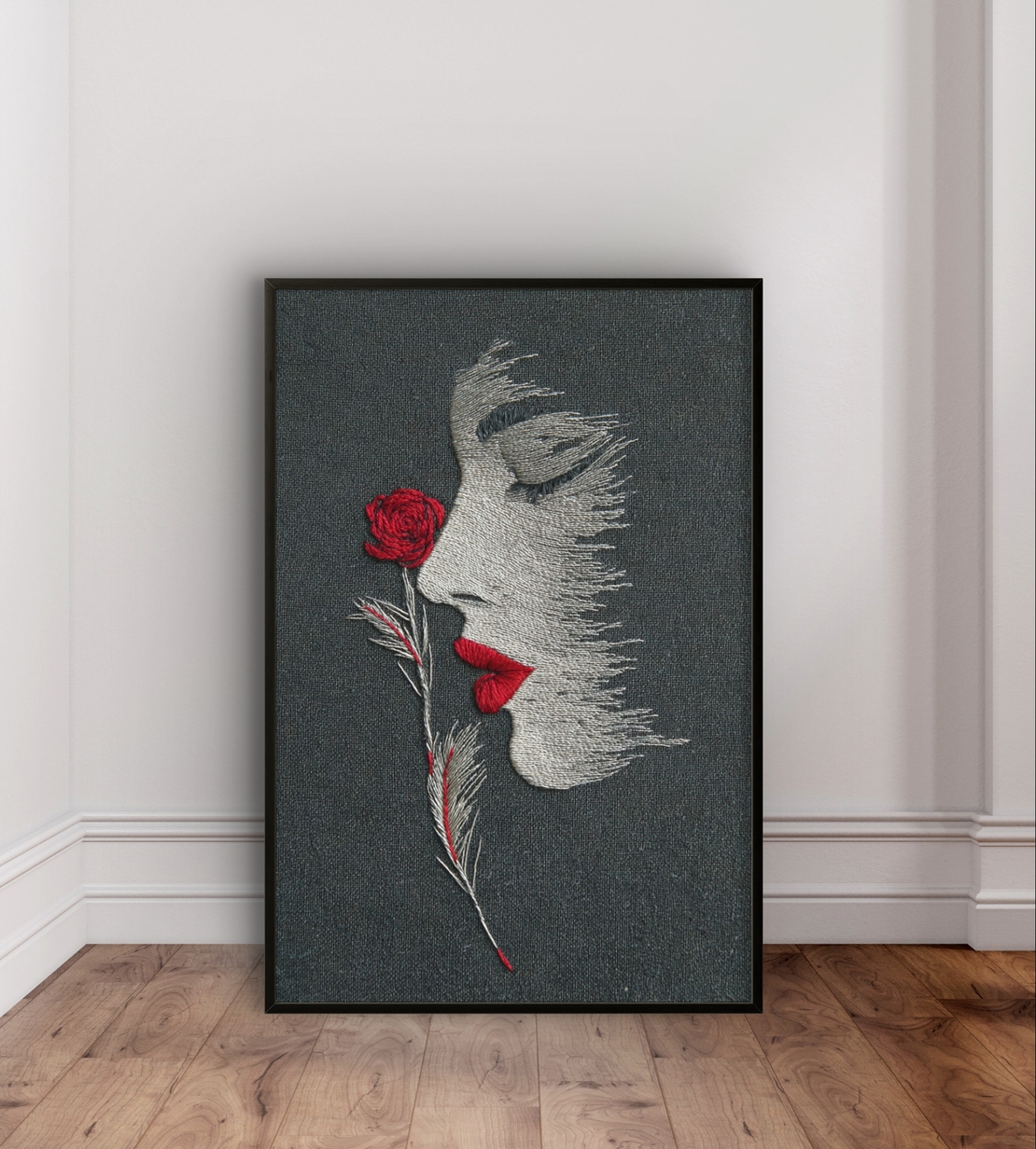 ציור מינימליסטי של פנים נשיות ופרח אדום