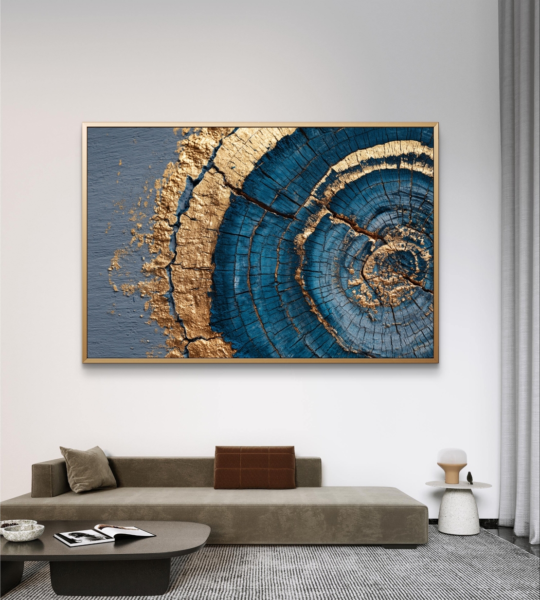 תמונת קנבס אבסטרקטית עם מעגלים בגווני כחול וזהב בהשראת חתך עץ