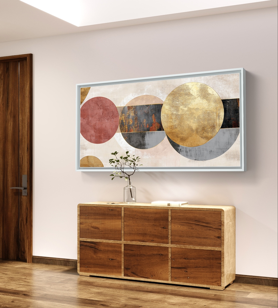 תמונת קנבס לרוחב בעיצוב אבסטרקטי עם מעגלים חופפים בגווני שמנת, זהב ואפור על רקע בהיר.