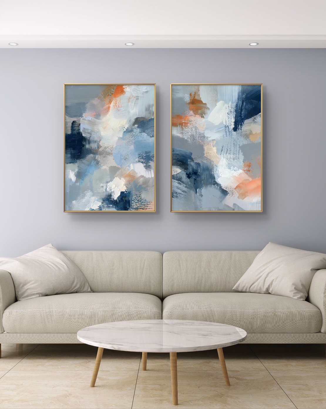סט תמונות קנבס זוגי בגווני כחול, אפור וכתום בעיצוב אבסטרקטי רך – תכשיט לבית