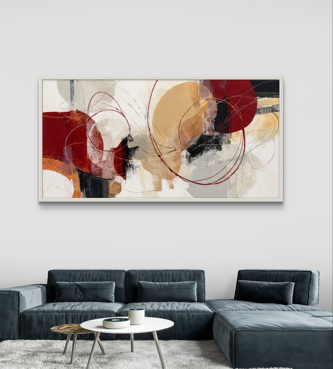 תמונת קנבס לרוחב בסגנון אבסטרקט עם מעגלים וקווים עדינים בגוונים חמים של אדום, בז’ וחרדל, לעיצוב סלון מודרני
