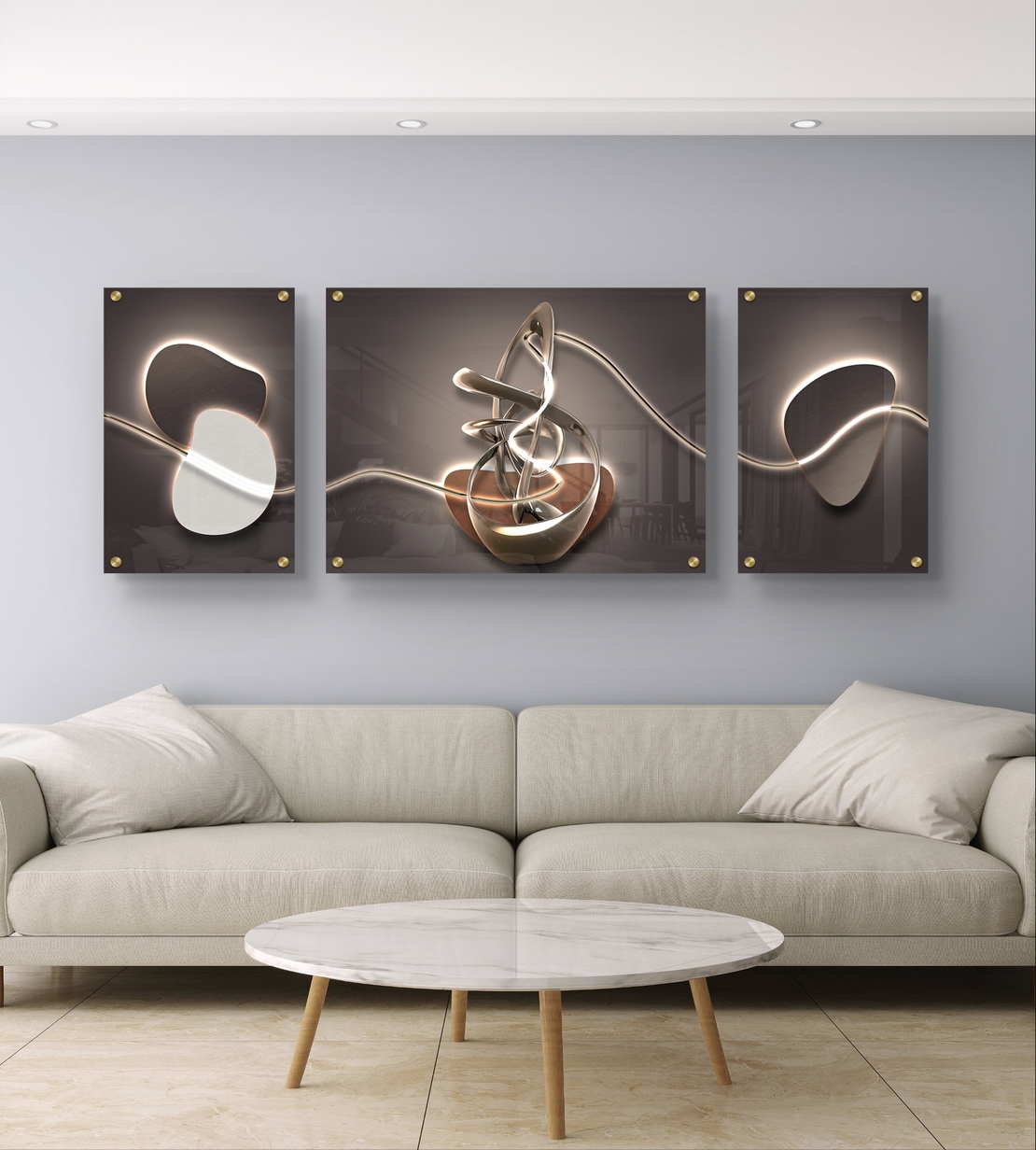 תמונת זכוכית מחולקת בעיצוב אבסטרקטי מודרני עם קווי אור וצורות זורמות