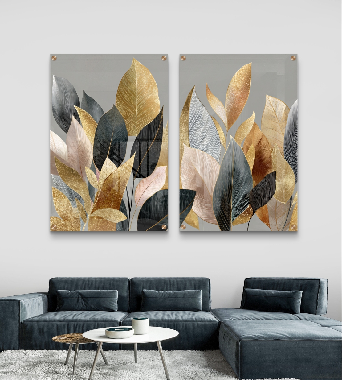 תמונת זכוכית זוגית עם עלים בגווני זהב, שמנת ושחור בעיצוב אלגנטי ומודרני