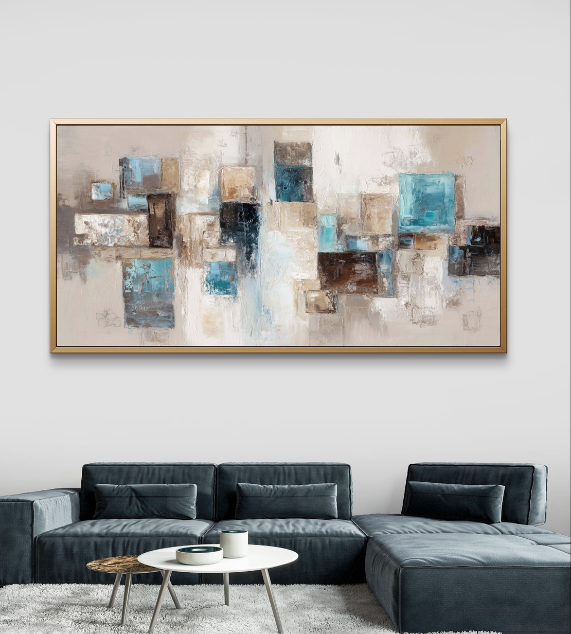 תמונת קנבס לרוחב בעיצוב אבסטרקטי עם צורות גאומטריות בגווני תכלת, בז’ ושמנת