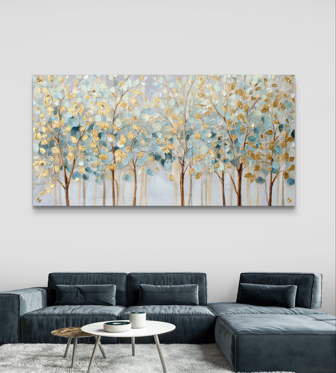 תמונת זכוכית לרוחב עם שדרת עצים בגווני תכלת וזהב בעיצוב יוקרתי ורגוע