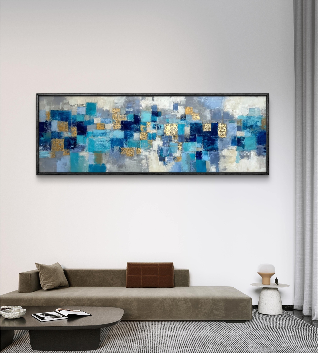 תמונת קנבס פנורמית מופשטת בגווני כחול וטורקיז עם נגיעות זהב – תכשיט לבית